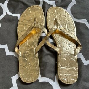 Coach gold flip flops size 9